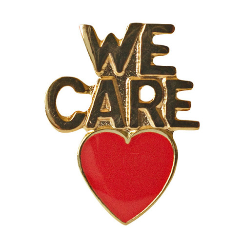 we care with red heart lapel pin